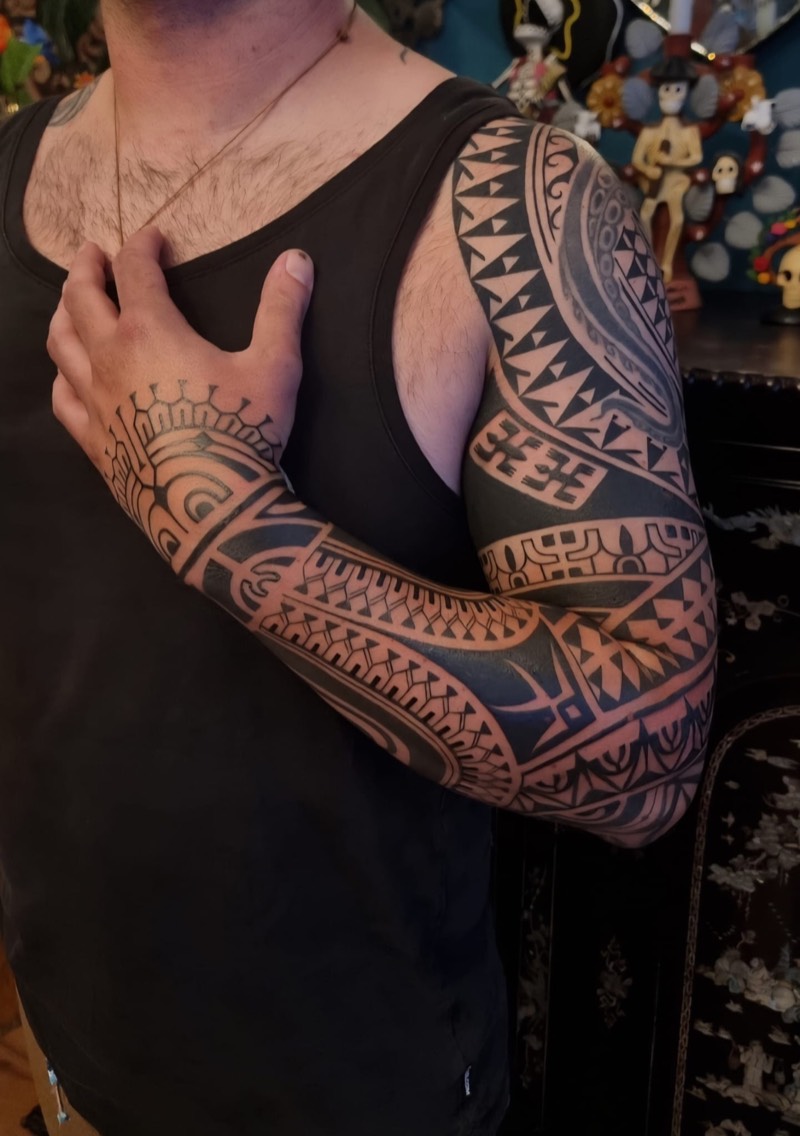Polynesian full sleeve tattoo