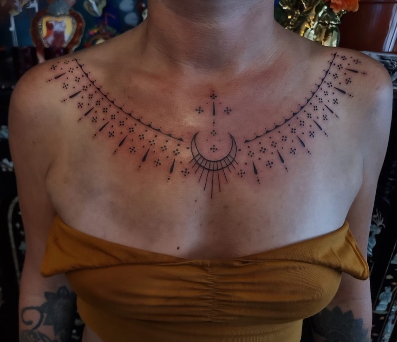 Ornamental chest piece with moon