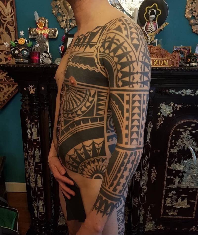 Polynesian upper arm tattoo
